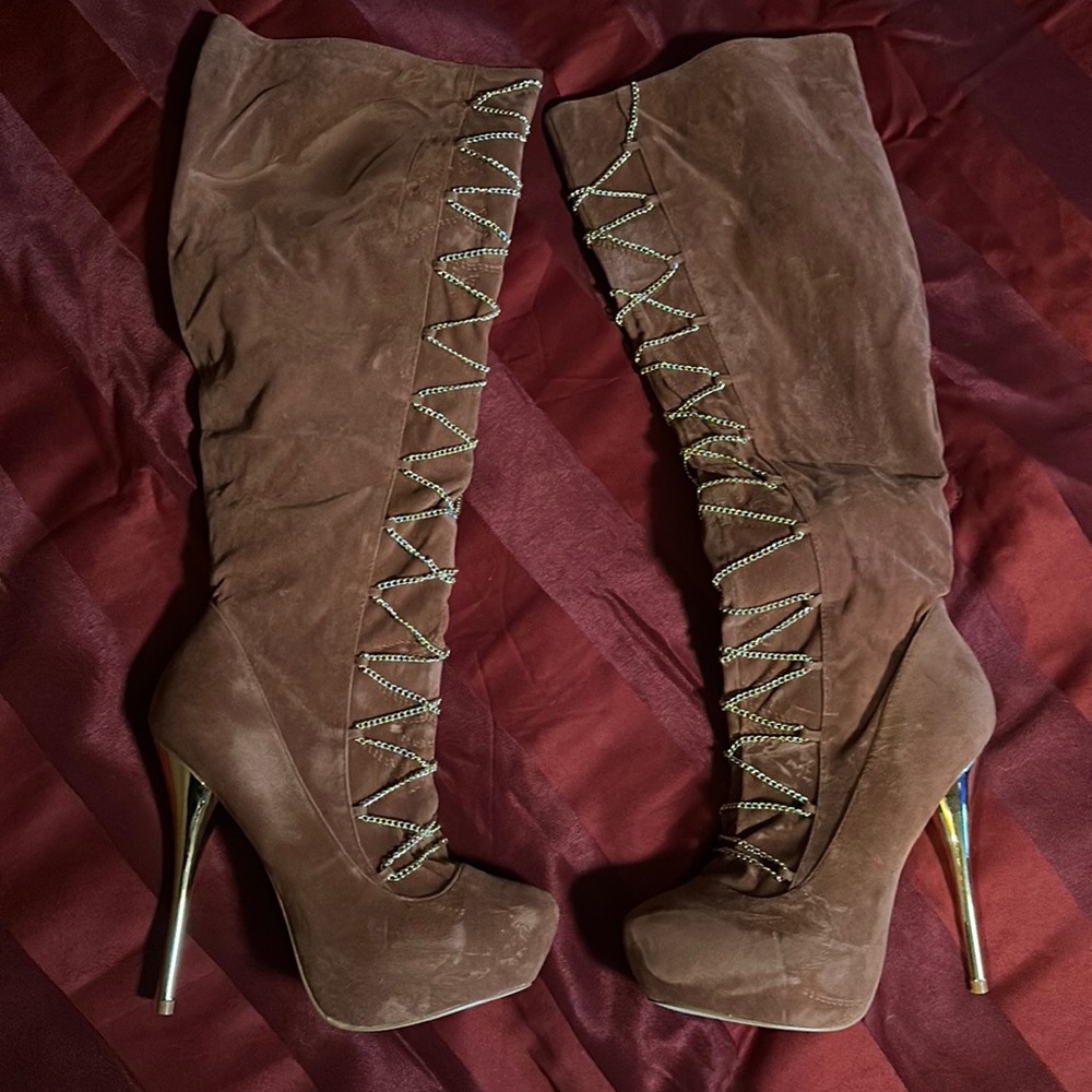 Slightly worn Cognac color Heel Boots. Great for going out.